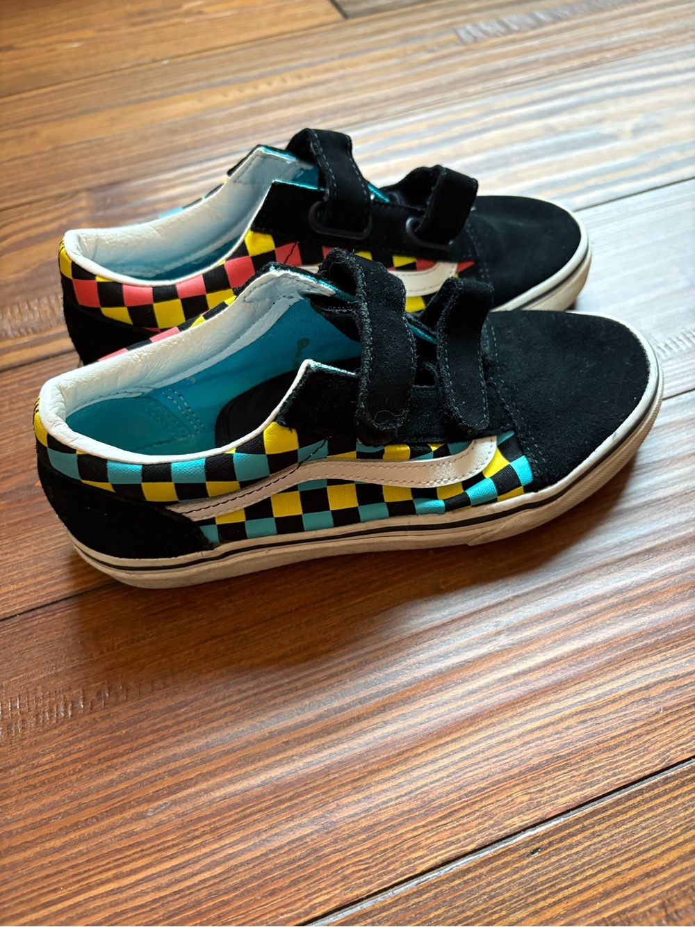 Vans Kids Black Sneakers with Yellow, Blue, and Red Checkerboard